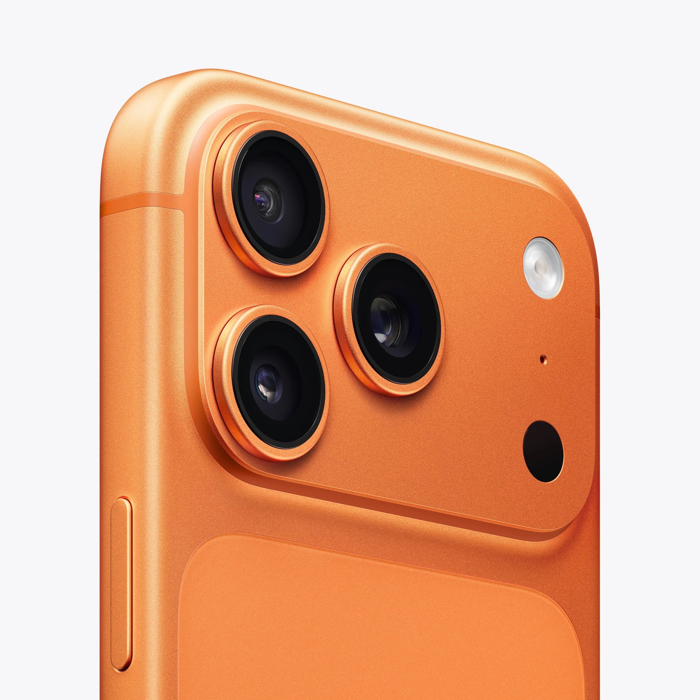 Cosmic orange smartphone close-up of triple rear camera lenses and flash