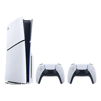 PlayStation 5 Slim console with two white DualSense controllers, angled view