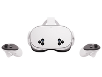 White VR headset with controllers attached, front view with head strap