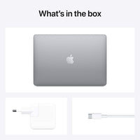 MacBook Air “What’s in the box” with laptop back and charging accessories