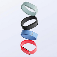 Set of fabric health tracker bands with metal buckles in black, blue, red