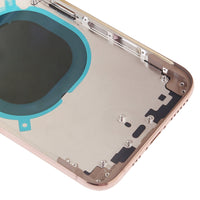 Gold iPhone XS back housing interior close-up with screw points and blue seal ring