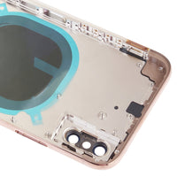 Gold iPhone XS back housing interior close-up with camera lens openings and mounting holes