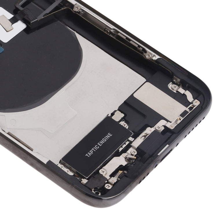 iPhone XS black housing assembly close-up: bottom frame with internal connectors