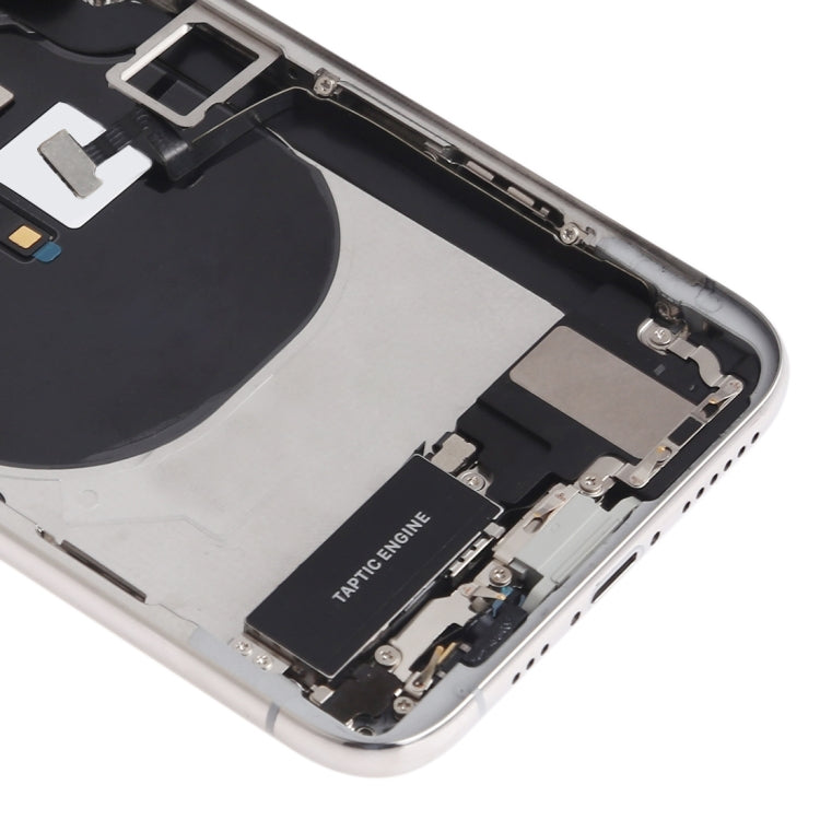 iPhone XS housing assembly corner view with charging port opening and taptic engine