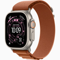 Apple Watch Ultra 3 with terra cotta Alpine Loop band and side buttons