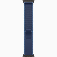 Apple Watch Ultra smartwatch with dark blue woven band, clasp tab visible