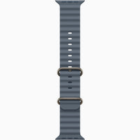 Light blue smartwatch band with perforated texture and metal buckle ends