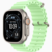 Apple Watch Ultra 3 neon green perforated silicone band with secure pin mounts