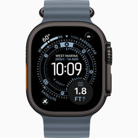 Apple Watch Ultra 3 with dark case and blue silicone band, front watch display
