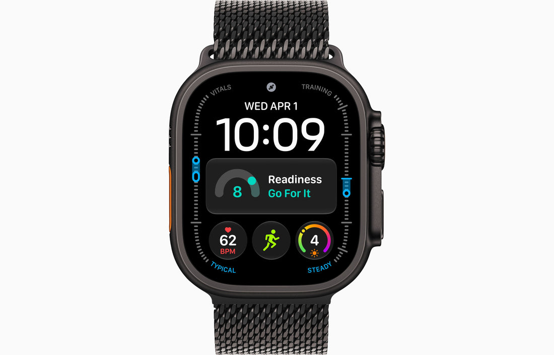 Black titanium smartwatch with black Milanese loop band, watch face showing 10:09