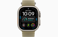 Ultra 4 smartwatch with Ocean Band, dark case, translucent taupe band.
