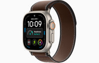Apple Watch Ultra 4 smartwatch with dark umber Trail Loop strap, natural case.