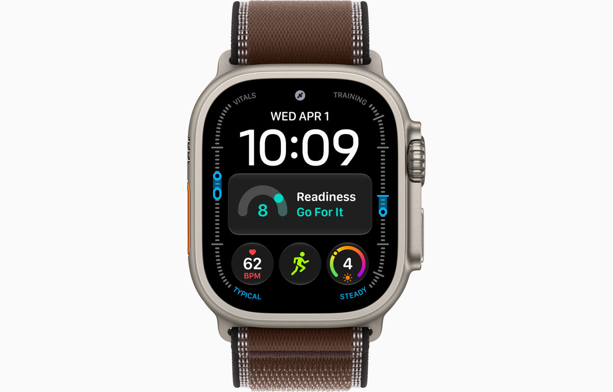 Apple Watch Ultra 4 smartwatch with dark umber Trail Loop strap, natural case front view.