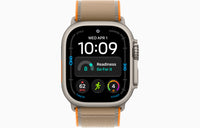 Apple Watch Ultra 4 smartwatch with sand Trail Loop strap, natural case front view.