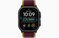 Apple Watch Ultra 4 smartwatch with burgundy Trail Loop strap, black case front display.