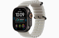 Ultra 4 smartwatch with Ocean Band, silver case, translucent off-white band.