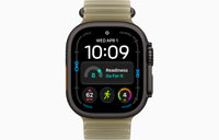 Ultra 4 smartwatch with Ocean Band, dark case, translucent taupe band.