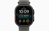 Smartwatch with dark translucent ocean band showing fitness screen