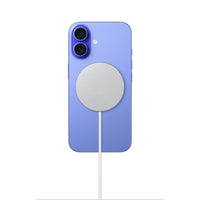 MagSafe charger on blue phone back, light puck and white charging cable