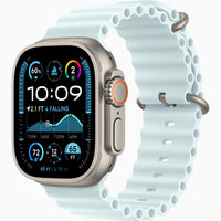Apple Watch Ultra 2 with light blue perforated sport band and titanium-style case
