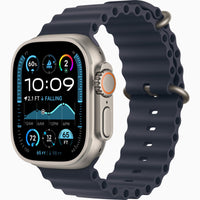 Apple Watch Ultra 2 with dark navy perforated sport band and titanium-style case
