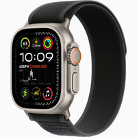 Apple Watch Ultra 2 with dark green fabric band and silver titanium case, angled side view