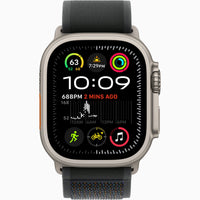 Apple Watch Ultra 2 with navy fabric band and silver titanium case, front view close-up