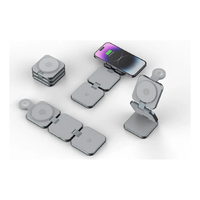 Gray 3-in-1 foldable wireless charger layout: watch pad, phone pad, and two flat pads