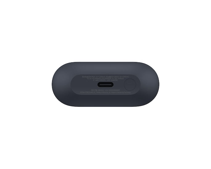 Dark wireless earbud case bottom with charging port cutout and label markings
