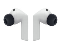 Light gray wireless earbuds shown from the side with black silicone ear tips