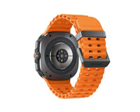 Back view of Galaxy Watch Ultra 2025 with orange perforated strap and metal case