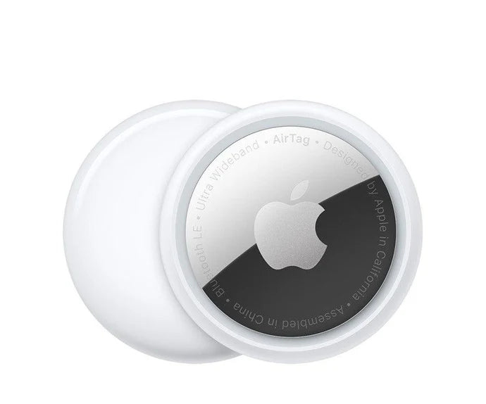 Apple AirTag tracker, white round device with protective outer ring