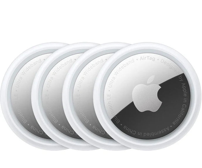 4-pack Apple AirTag trackers, white round devices with outer protective rings