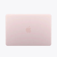 13-inch MacBook back in blush pink with centered Apple logo
