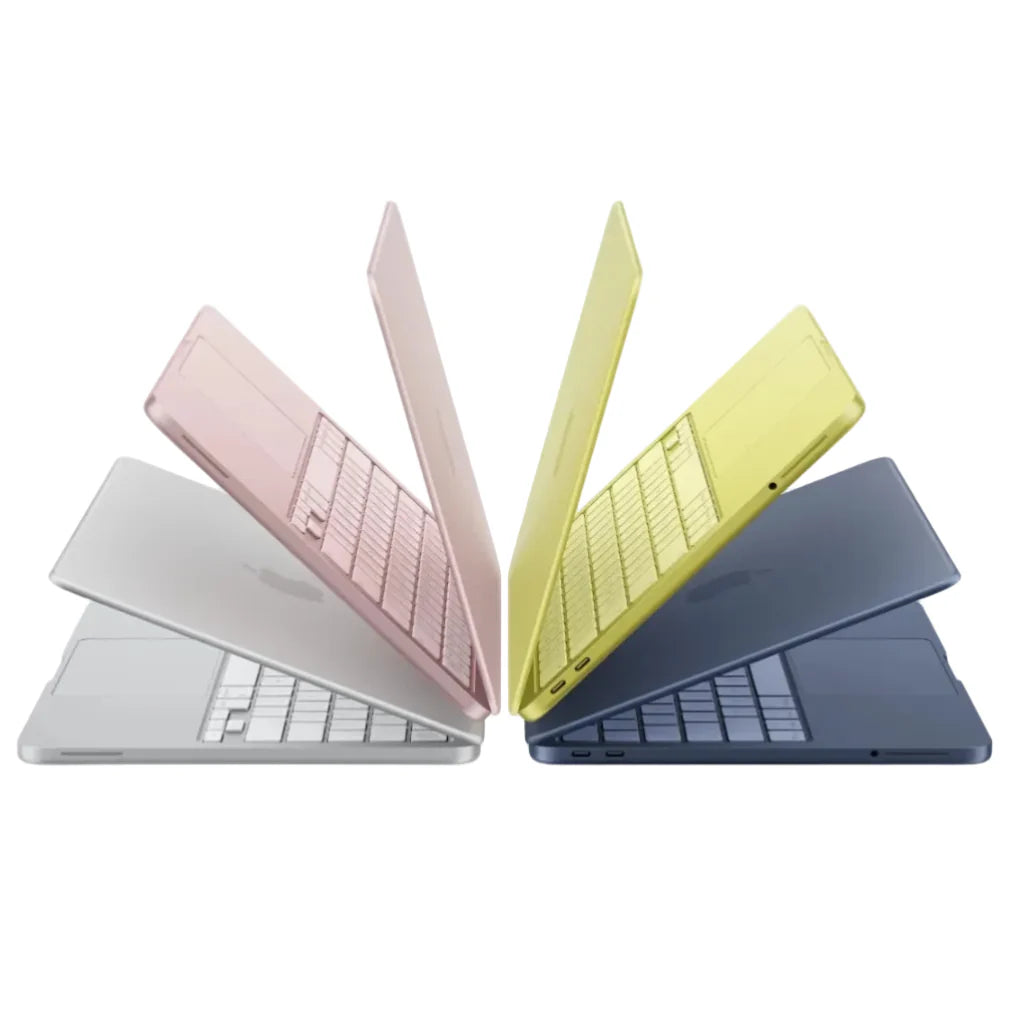 MacBook laptops in assorted colors with screens and keyboards